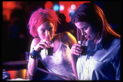 Claude with happy girl in club